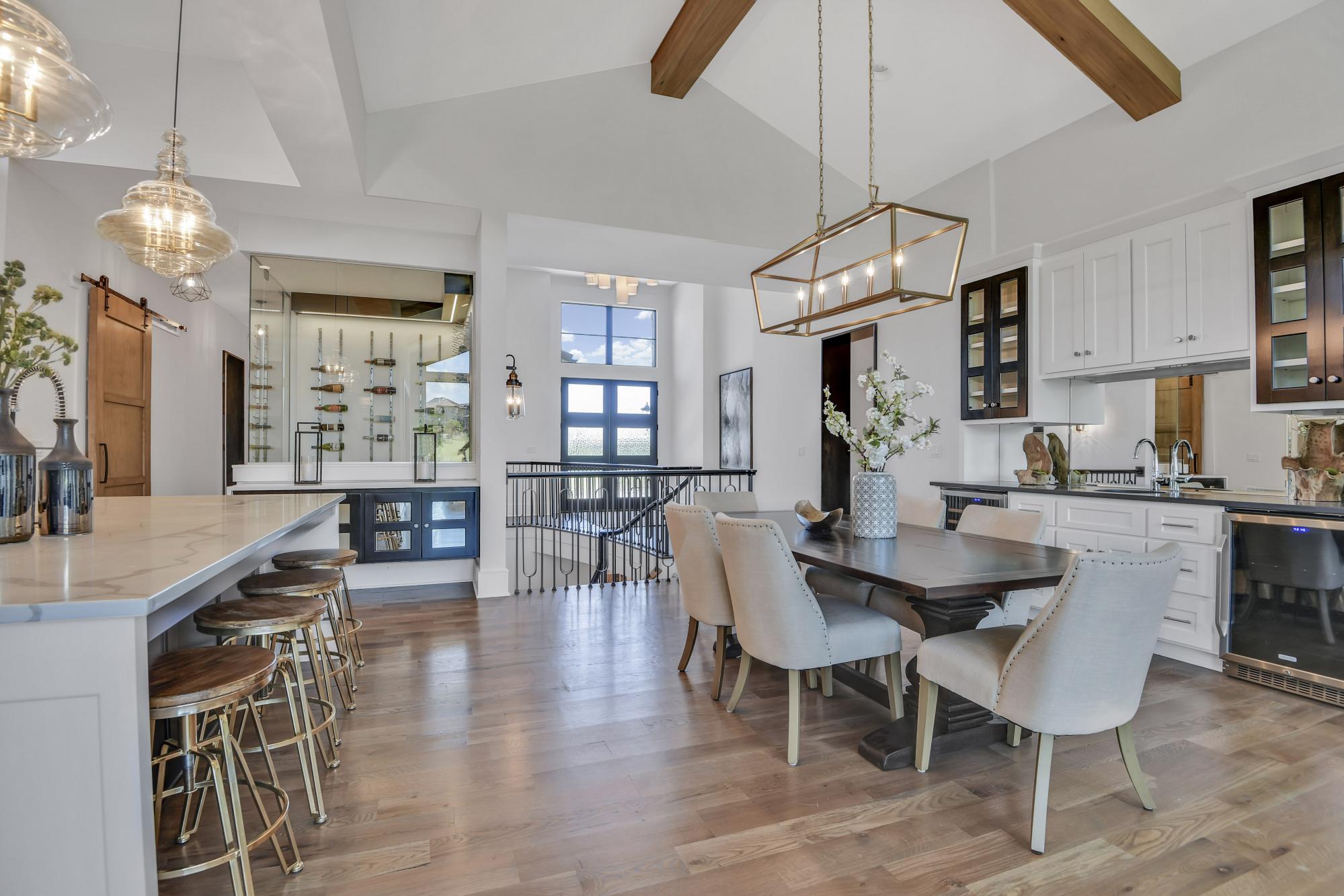 Kitchen and dining room area in an Oakmont model from Lambie Custom Homes