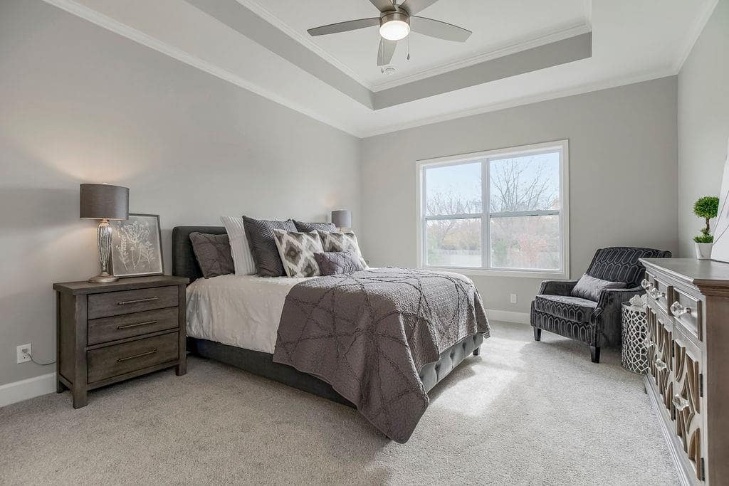 Large bedroom in an Enclave at Prairie Star home From Lambie homes