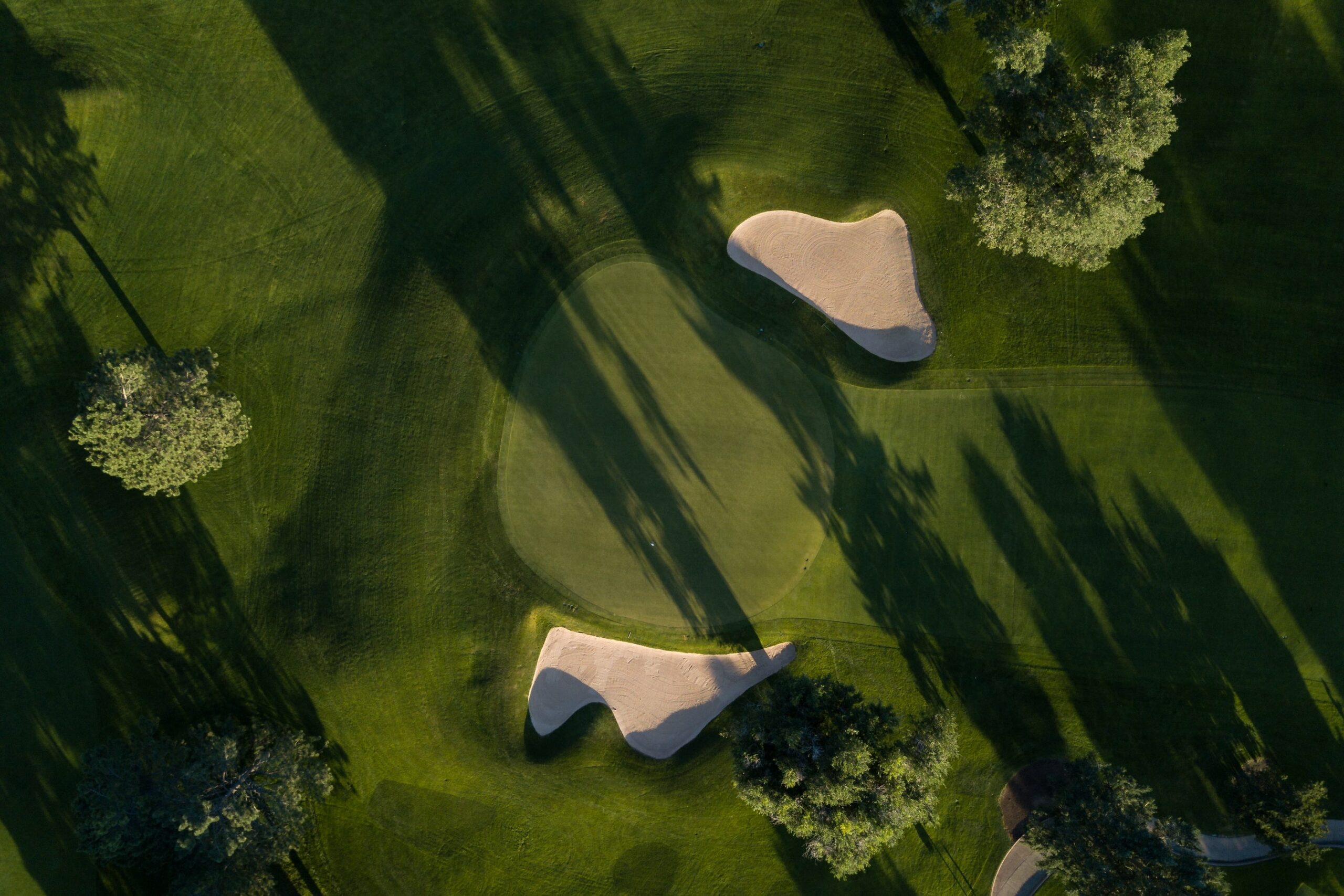 drone shot of a golf course green
